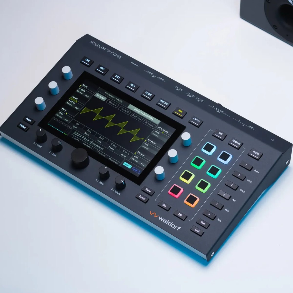 Waldorf Iridium Core desktop synthesizer on a white desk, seen from above